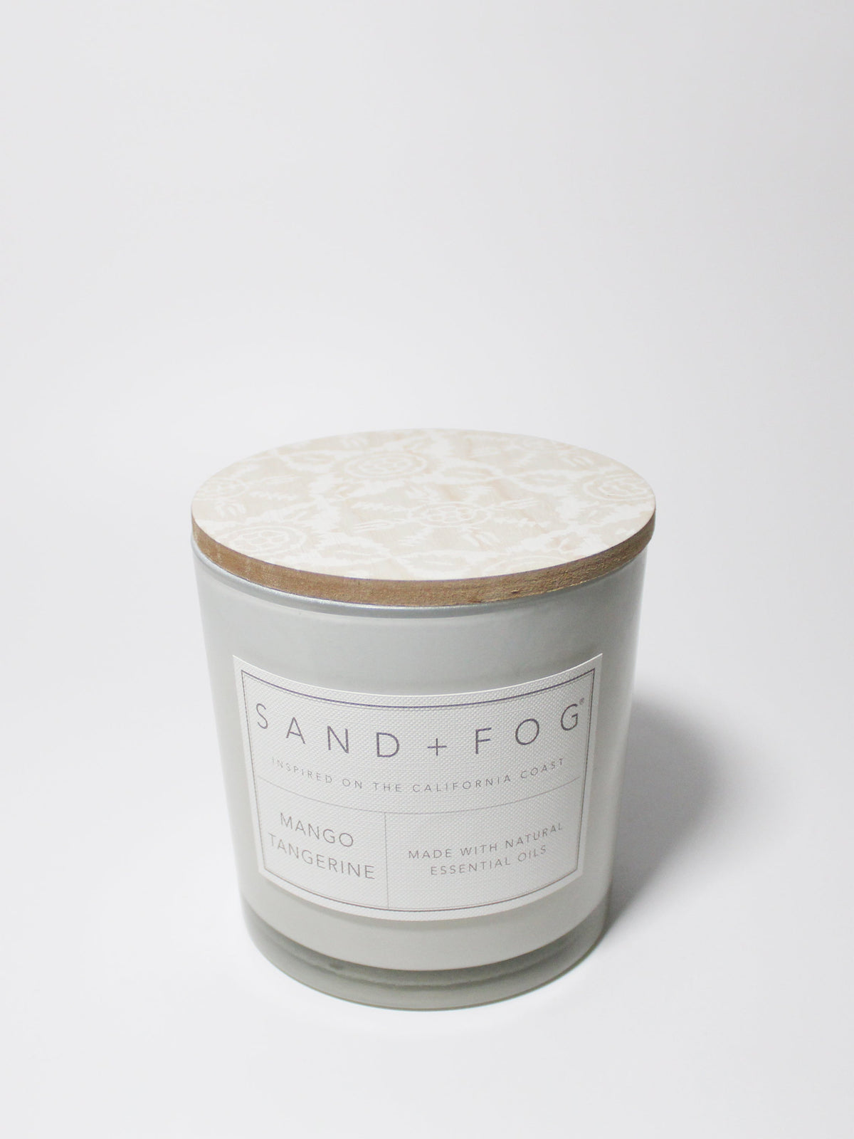 Mango Tangerine 21 oz candle with a wood lid